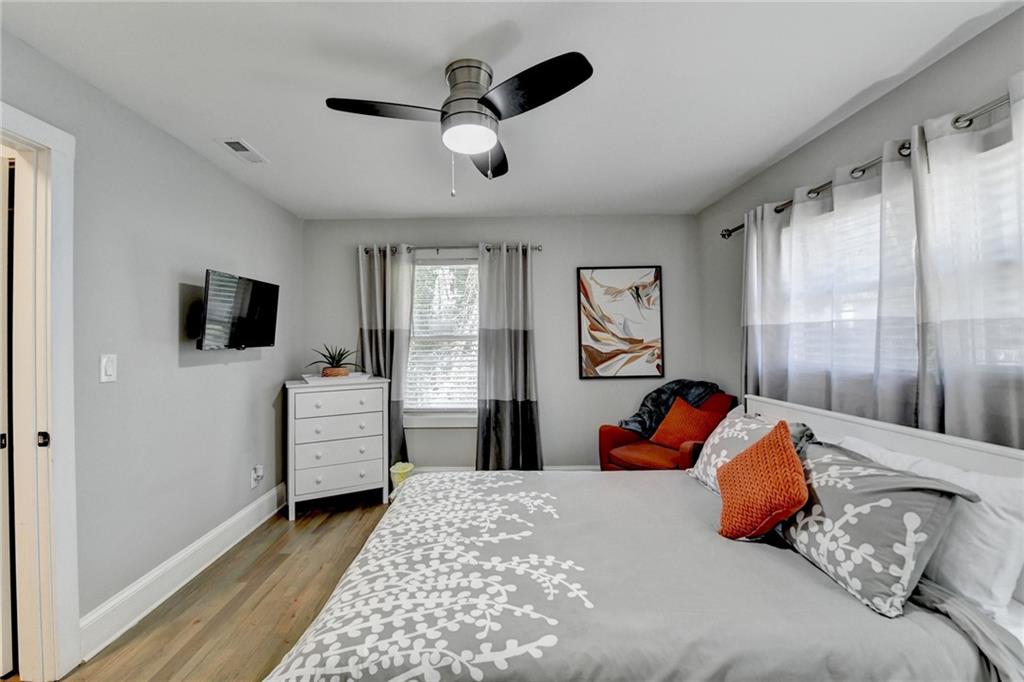 2945 Monterey Drive Decatur, GA 30032 - Photo 47 of 93 a bedroom with a bed and flat screen tv