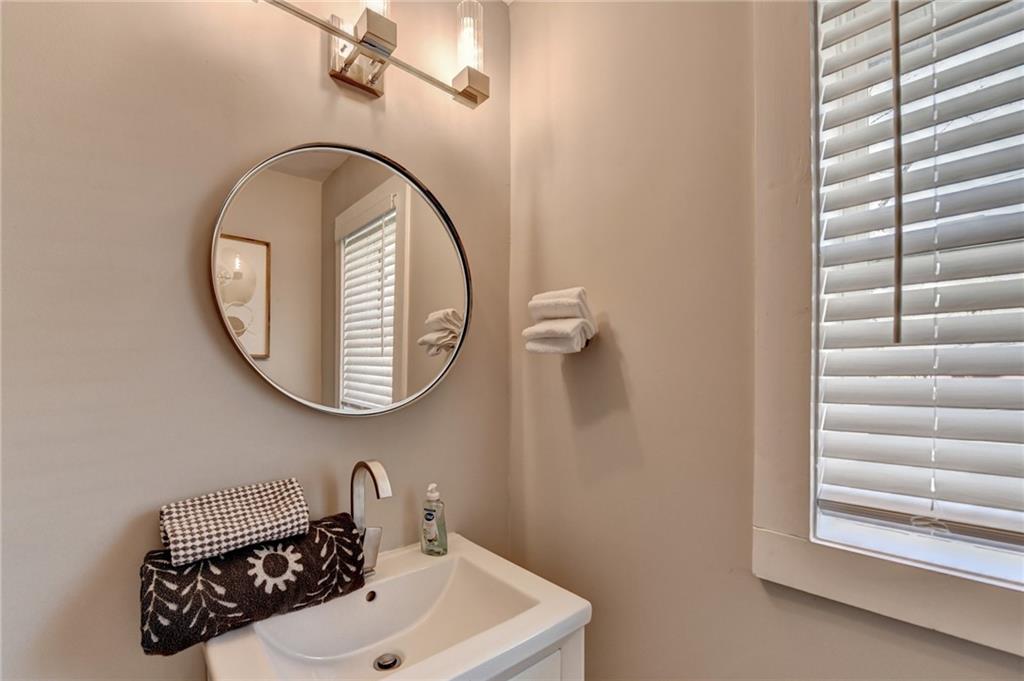 2945 Monterey Drive Decatur, GA 30032 - Photo 49 of 93 a bathroom with a sink and a mirror