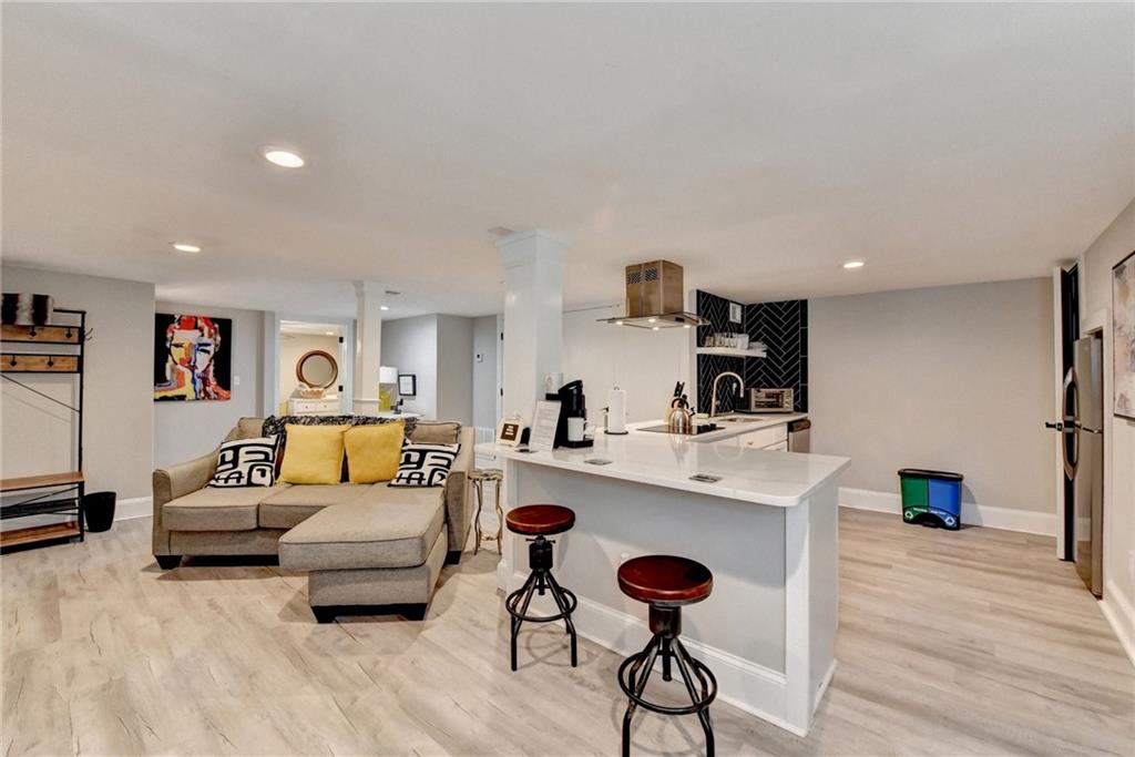 2945 Monterey Drive Decatur, GA 30032 - Photo 57 of 93 a living room with furniture and a wooden floor