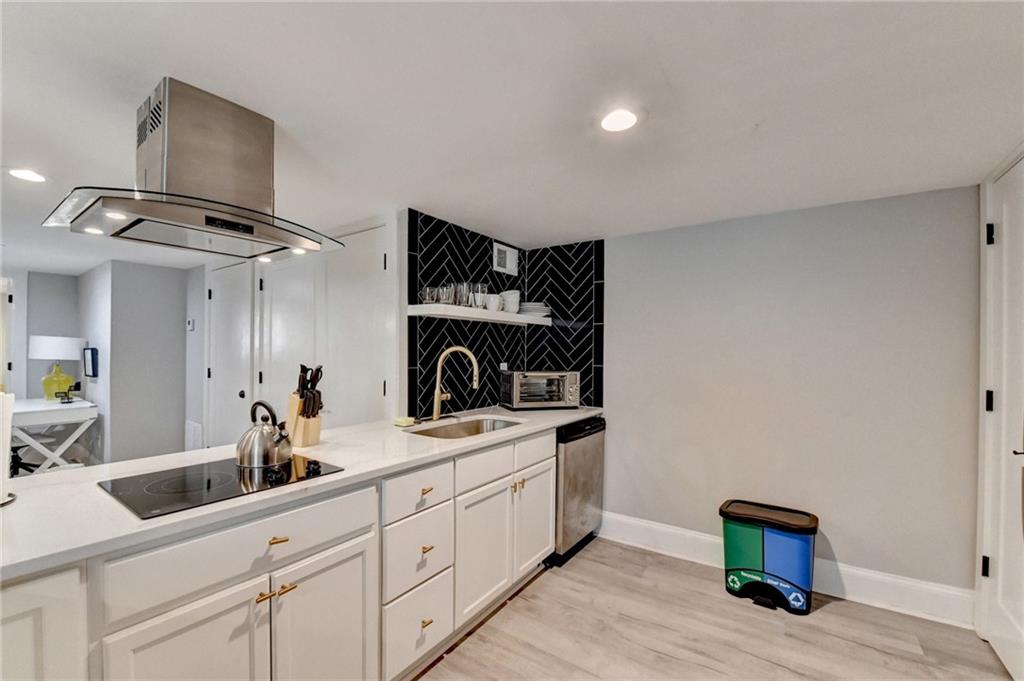 2945 Monterey Drive Decatur, GA 30032 - Photo 59 of 93 a kitchen with a sink and cabinets