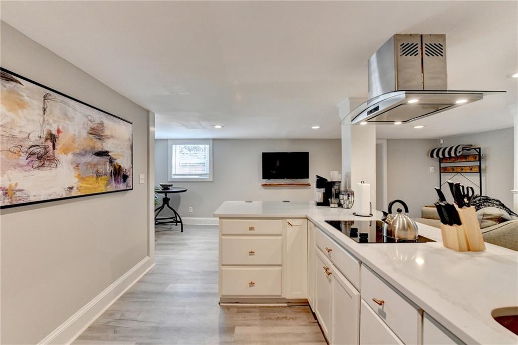 2945 Monterey Drive Decatur, GA 30032 - Photo 64 of 93 a large kitchen with a lot of counter space and wooden floor