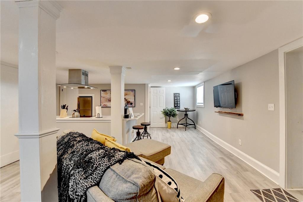 2945 Monterey Drive Decatur, GA 30032 - Photo 69 of 93 a living room with furniture and a flat screen tv