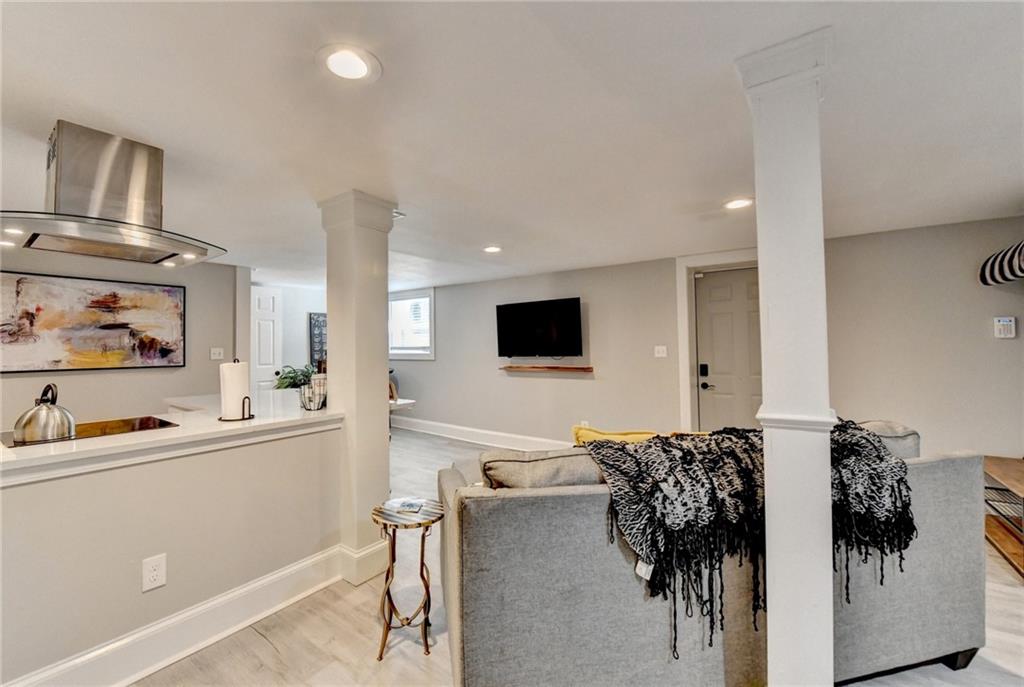 2945 Monterey Drive Decatur, GA 30032 - Photo 70 of 93 a living room with furniture and flat screen tv