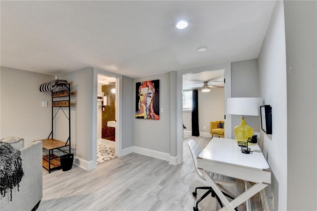2945 Monterey Drive Decatur, GA 30032 - Photo 72 of 93 a view of a workspace with furniture and a living room