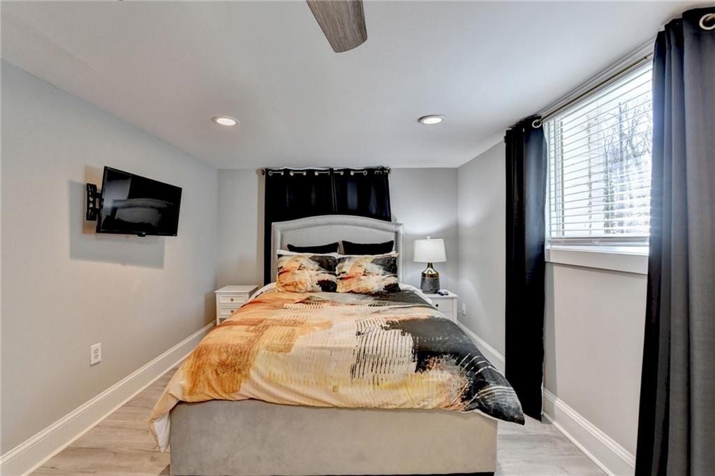 2945 Monterey Drive Decatur, GA 30032 - Photo 76 of 93 a en suite bathroom with a toilet sink and mirror