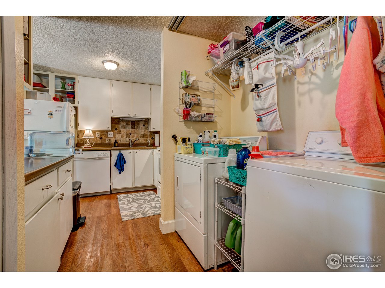 925 Columbia Road, Unit 113 Fort Collins, CO 80525 - Photo 7 of 20 Laundry right off the kitchen
