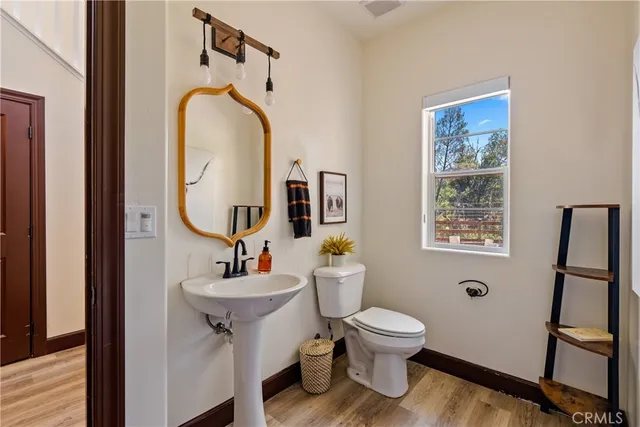 a view of a hallway with washer and dryer