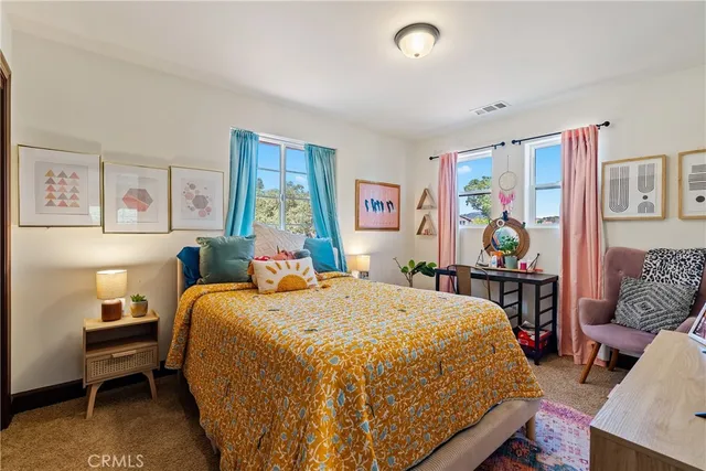 a bathroom with a shower and a toilet