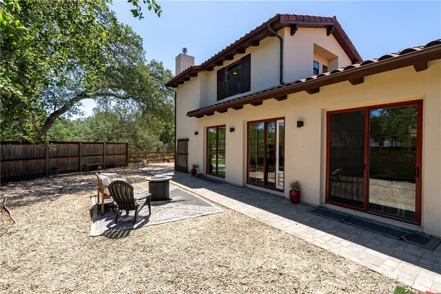 an aerial view of a house with a garden