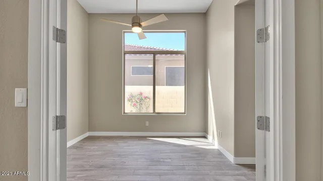 an empty room that has a window