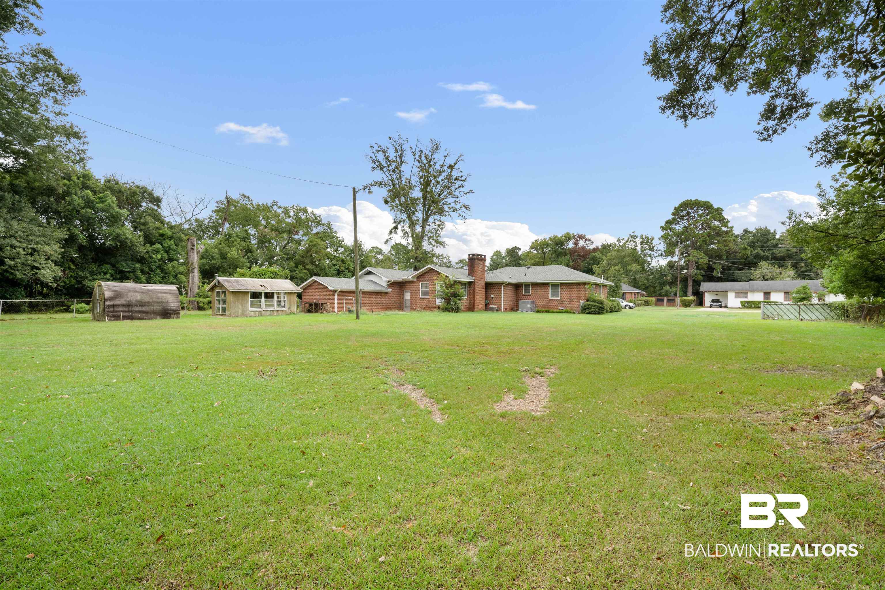 2300 Ellen Drive Mobile, AL 36605 - Photo 25 of 25 View of yard featuring an outbuilding