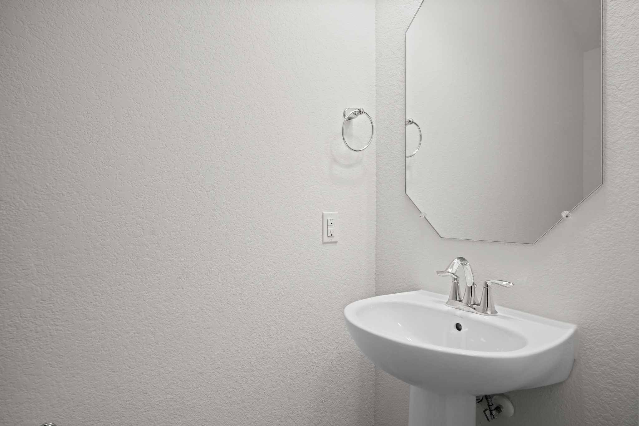 13005 Foreston Drive Austin, TX 78754 - Photo 19 of 36 a bathroom with a sink and a mirror