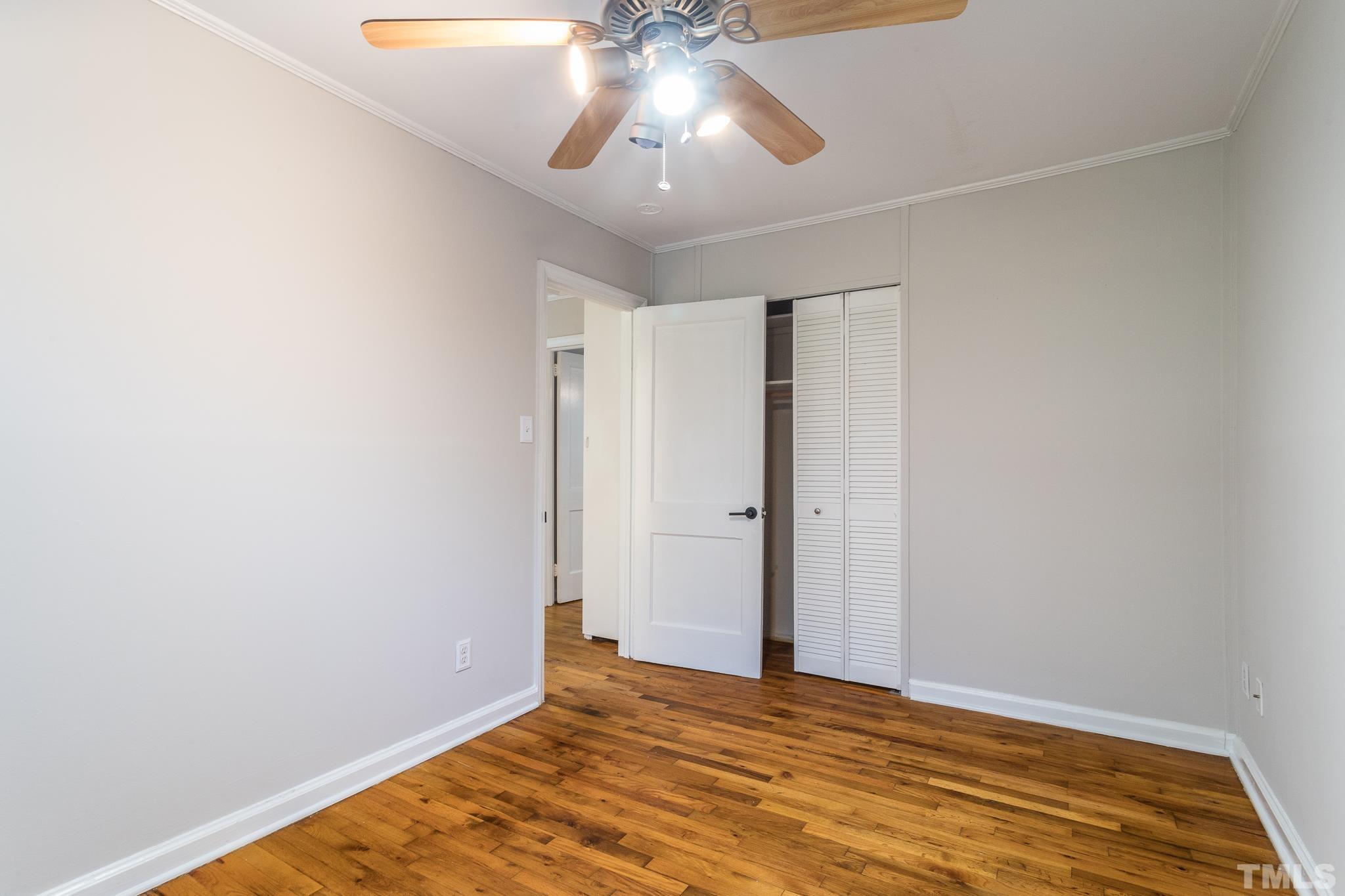 2620 McNeil Street, Unit 2620 Raleigh, NC 27608 - Photo 18 of 23 a view of empty room with wooden floor