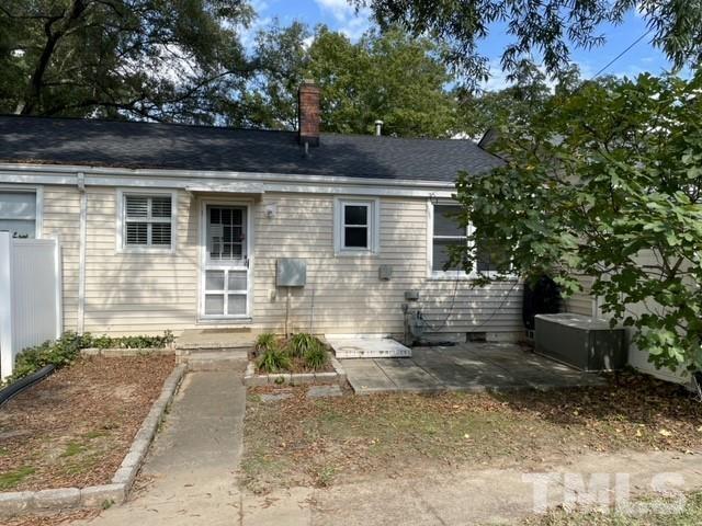 2620 McNeil Street, Unit 2620 Raleigh, NC 27608 - Photo 21 of 23 a front view of a house with a yard