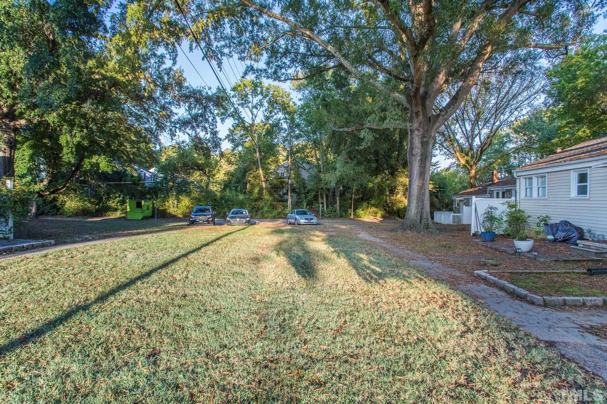 2620 McNeil Street, Unit 2620 Raleigh, NC 27608 - Photo 22 of 23 a view of yard with swimming pool and sitting area