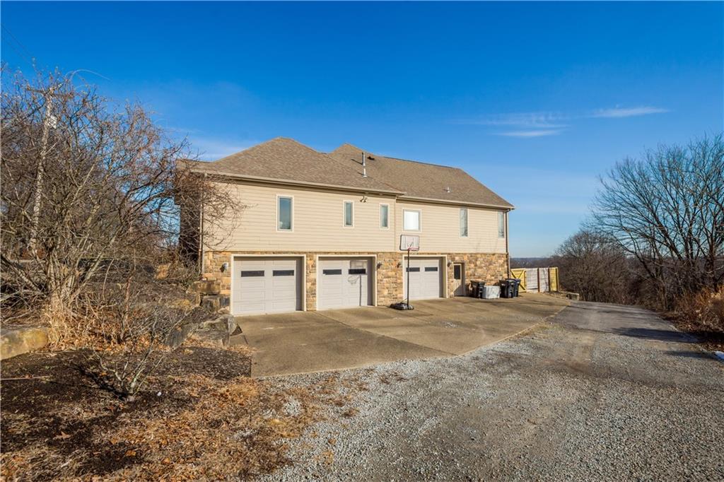 806 Harmony Road Pittsburgh, PA 15237 - Photo 42 of 49 3 car garage with radiant heated floor. Lots of space for extra parking.