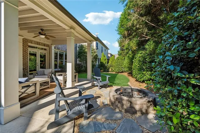 a view of yard with patio