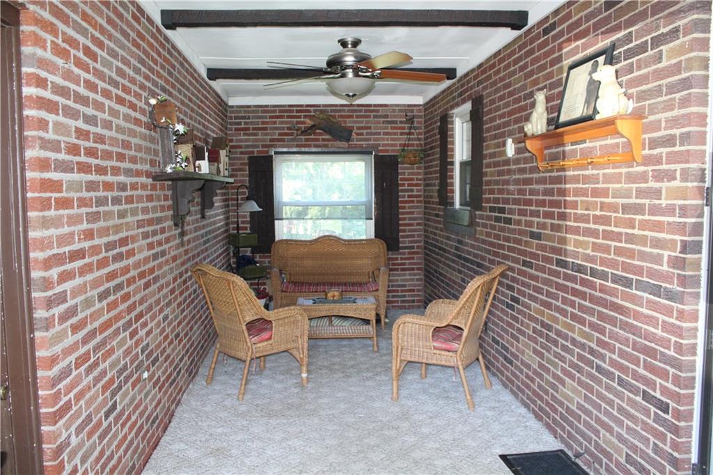 1957 Brodhead Road Aliquippa, PA 15001 - Photo 2 of 19 Breezeway between home and attached garage welcomes you into the home thru a double french door, enjoy your morning coffee, sit and read a good book. Lovely place to retire and unwind for the day.