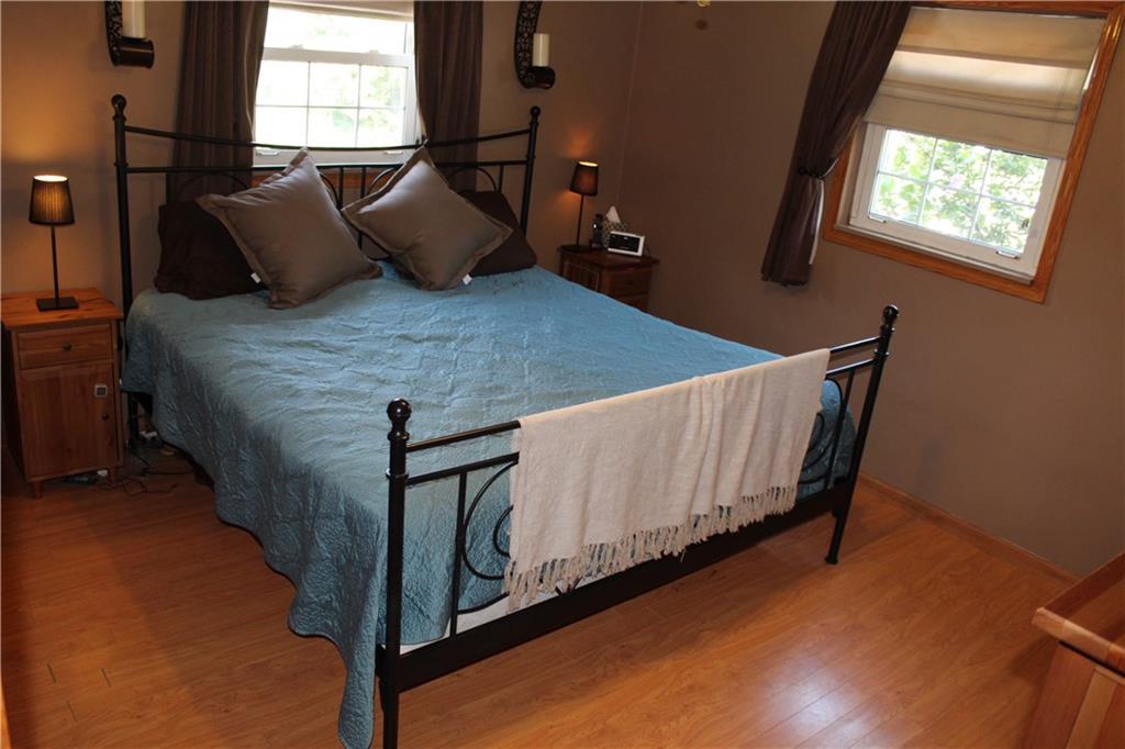 1957 Brodhead Road Aliquippa, PA 15001 - Photo 6 of 19 Master bedroom can hold larger furniture plus offers two windows and large closet. Ceiling fan is also in this room. Crown molding, updated windows and flooring - No need for work here!!