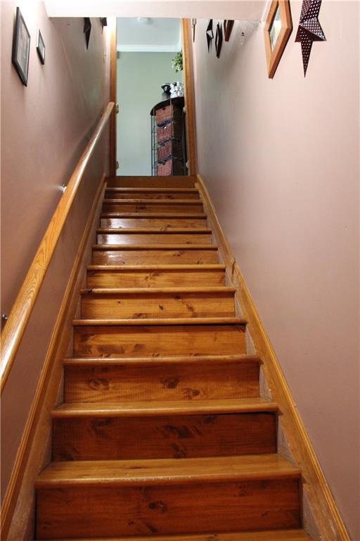 1957 Brodhead Road Aliquippa, PA 15001 - Photo 10 of 19 Interior steps from main level to lower level. Fully finished