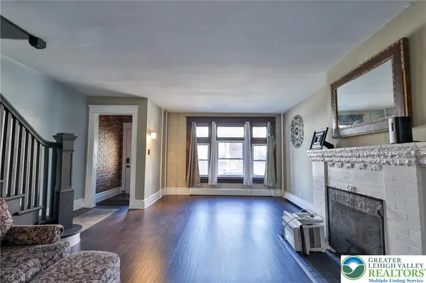 a view of livingroom with furniture and fireplace