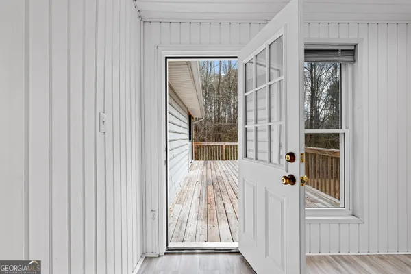 a view of a porch with a backyard