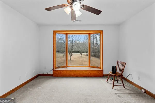 $595,000 | 423 Woods Road, Brooks, GA 30205