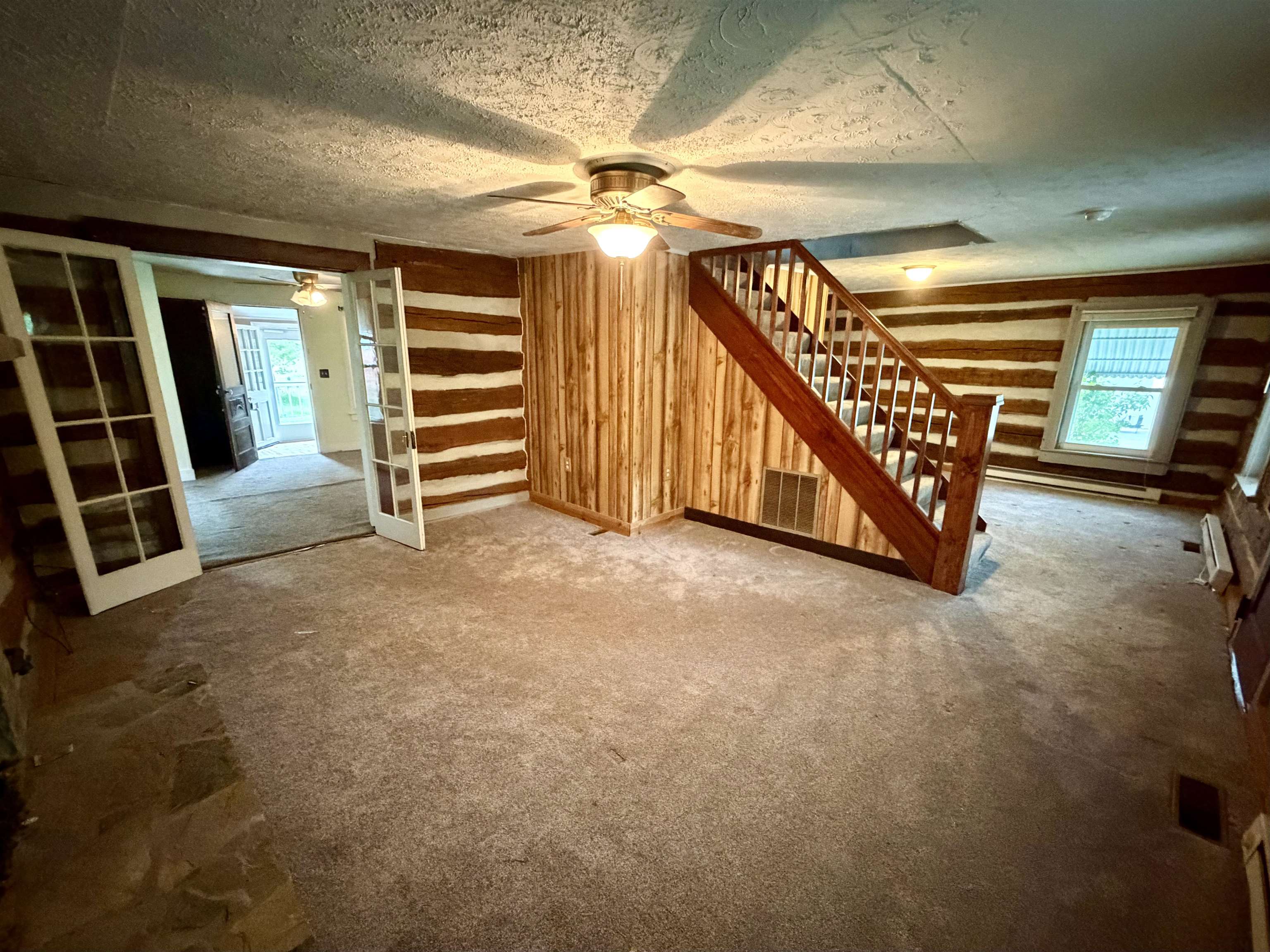 3648 Middlebrook Village Road Middlebrook, VA 24459 - Photo 8 of 48 a view of an empty room with stairs and furniture