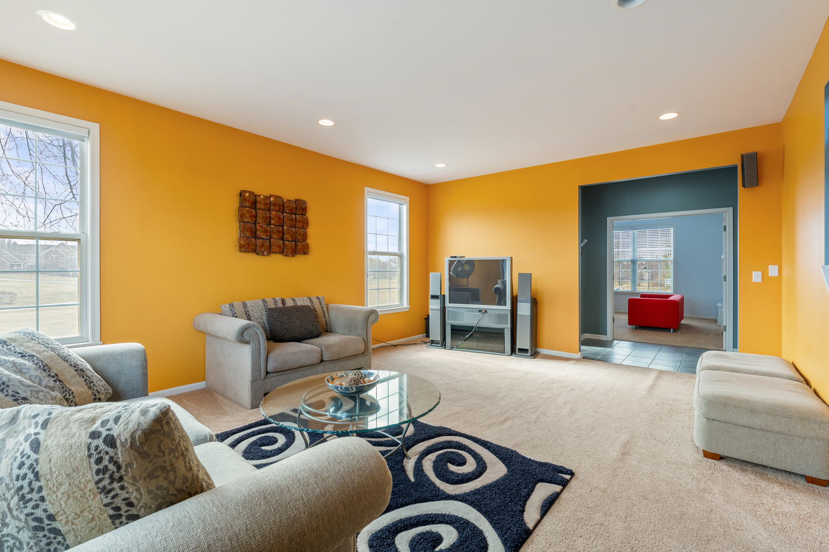 809 Magnuson Court Barrington, IL 60010 - Photo 11 of 33 a living room with furniture and a flat screen tv