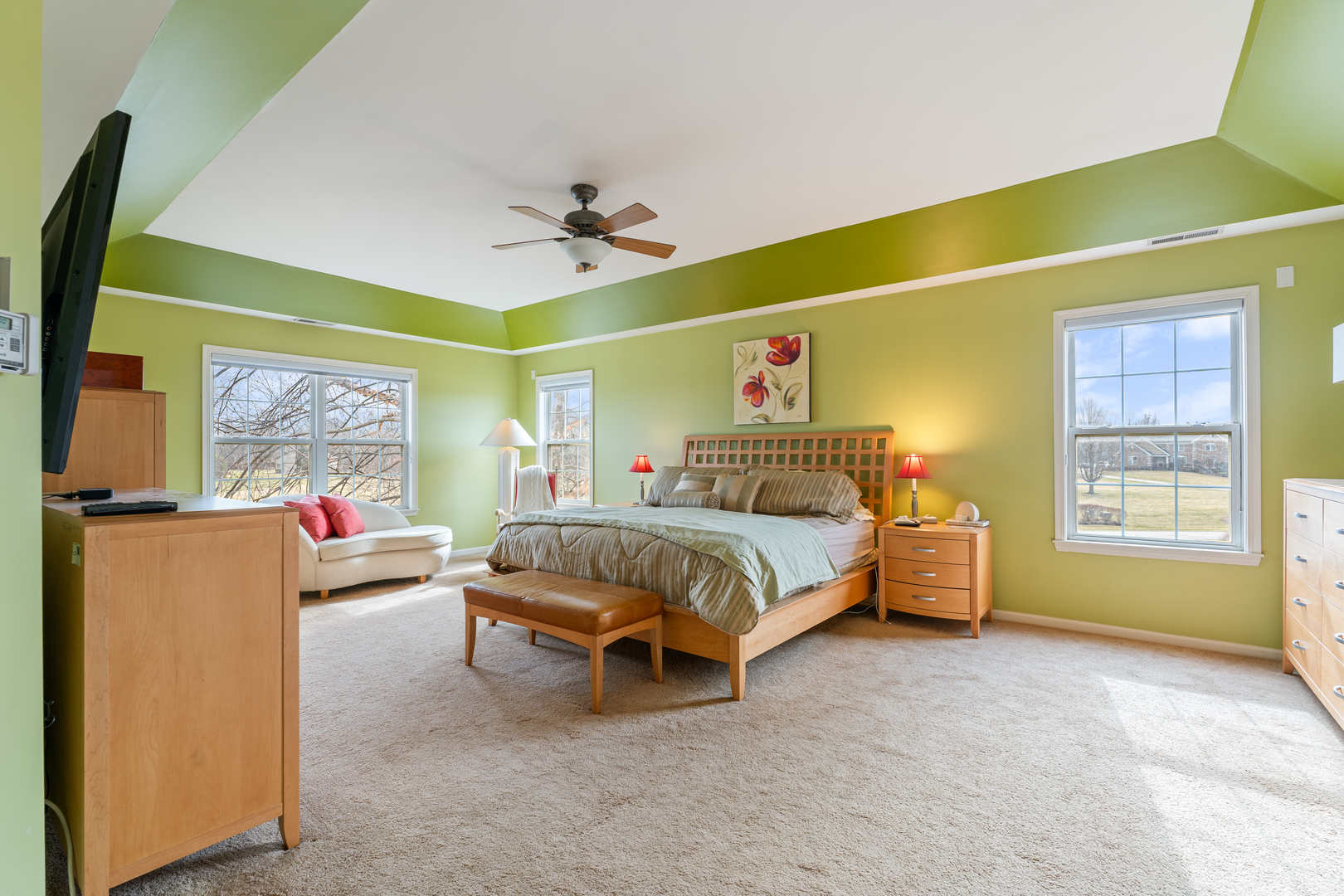 809 Magnuson Court Barrington, IL 60010 - Photo 19 of 33 a bedroom with a bed and a chandelier
