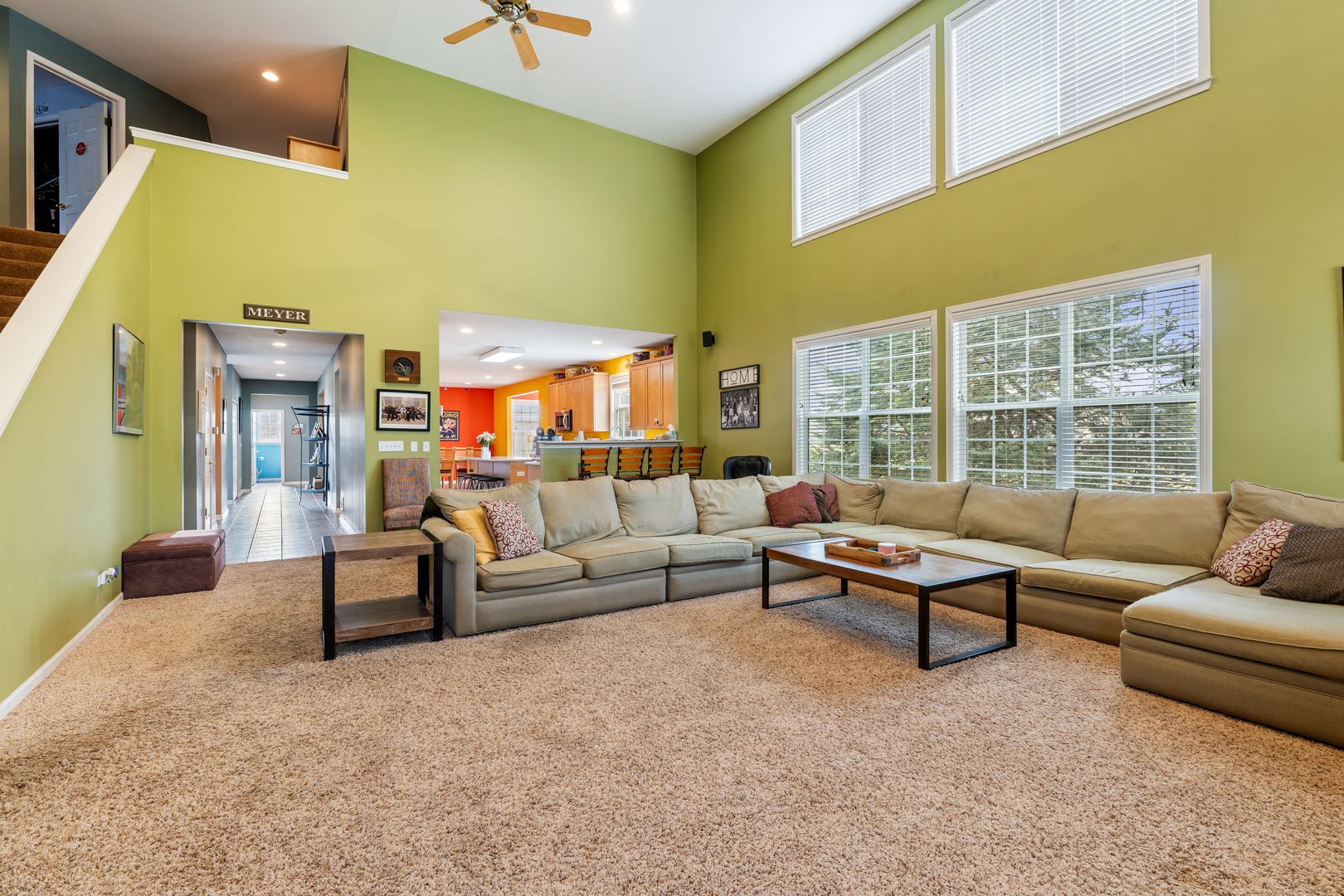 809 Magnuson Court Barrington, IL 60010 - Photo 4 of 33 a living room with furniture and a floor to ceiling window