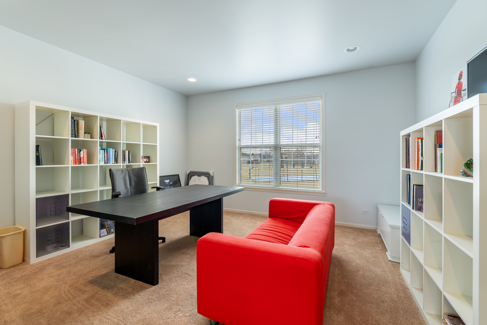809 Magnuson Court Barrington, IL 60010 - Photo 9 of 33 a view of a workspace with furniture and a window