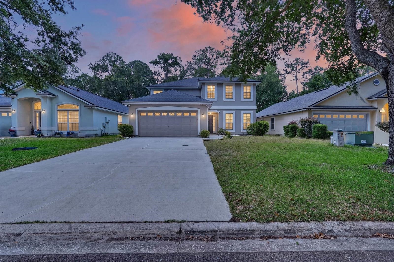 1237 Splendid Ravine Street St. Augustine, FL 32092 - Photo 61 of 62 a front view of house with yard and green space