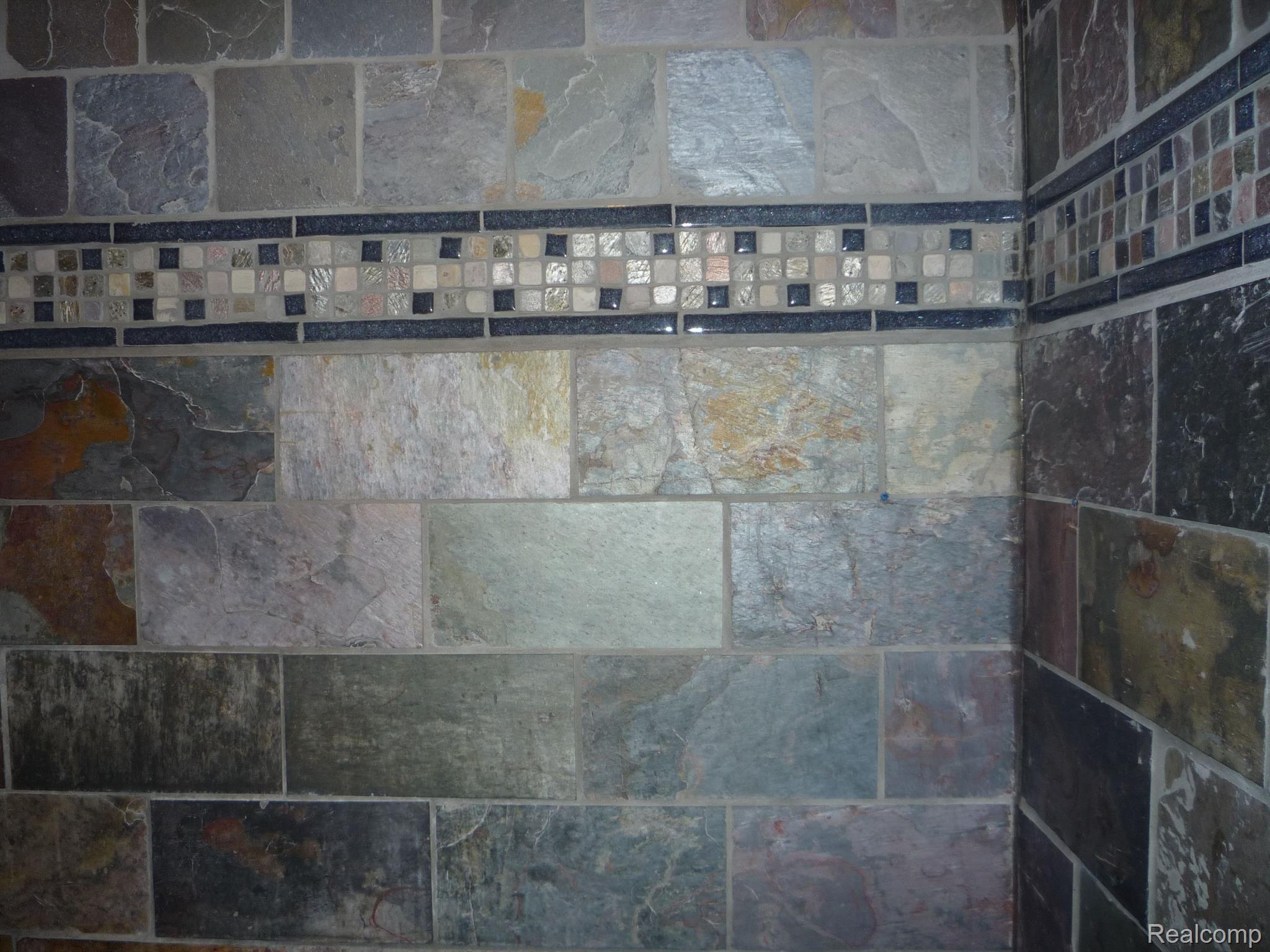 1423 Rillview Court Metamora, MI 48455 - Photo 30 of 62 tile in primary bath