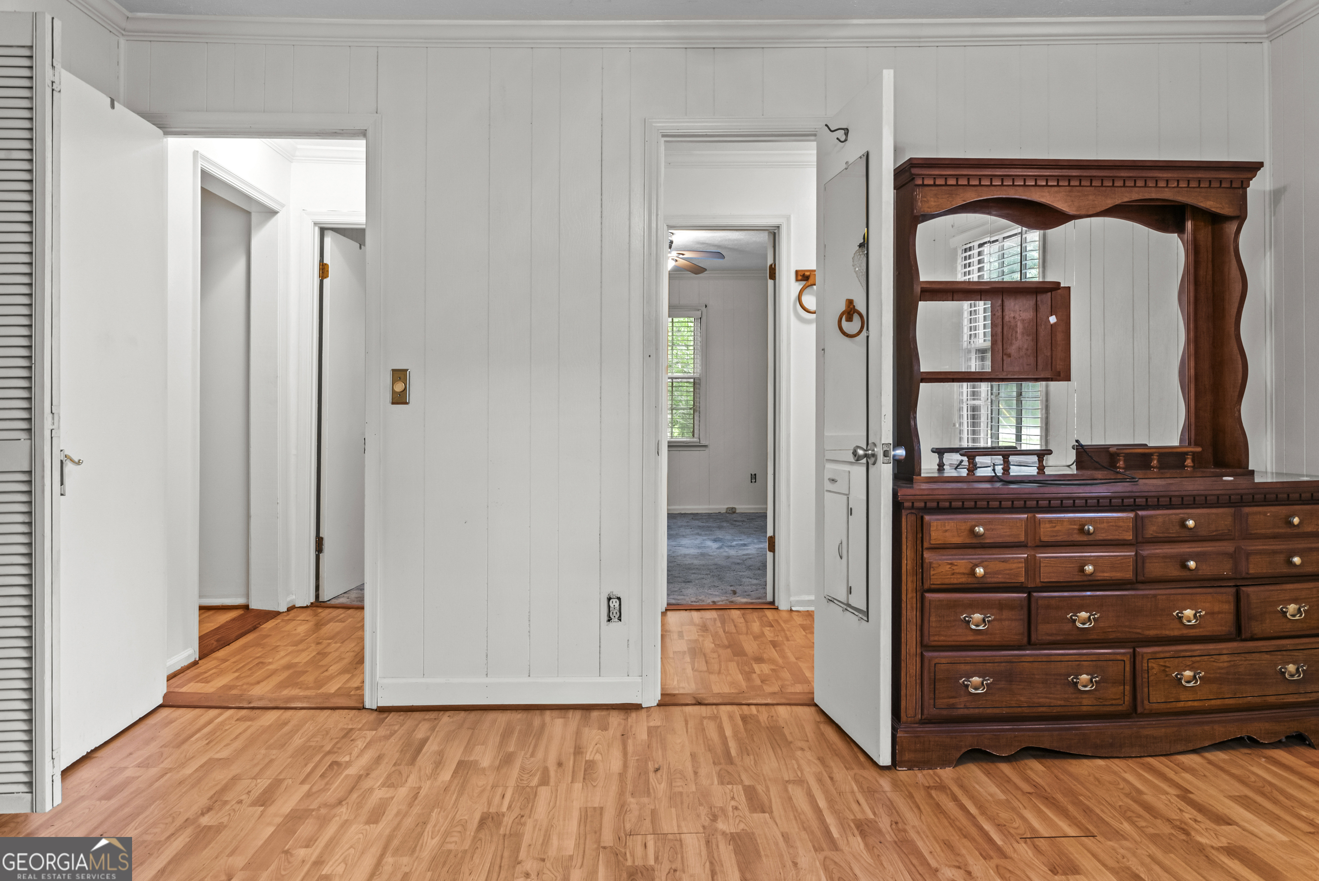 724 Hill Street Madison, GA 30650 - Photo 25 of 36 a view of room with window and wooden floor
