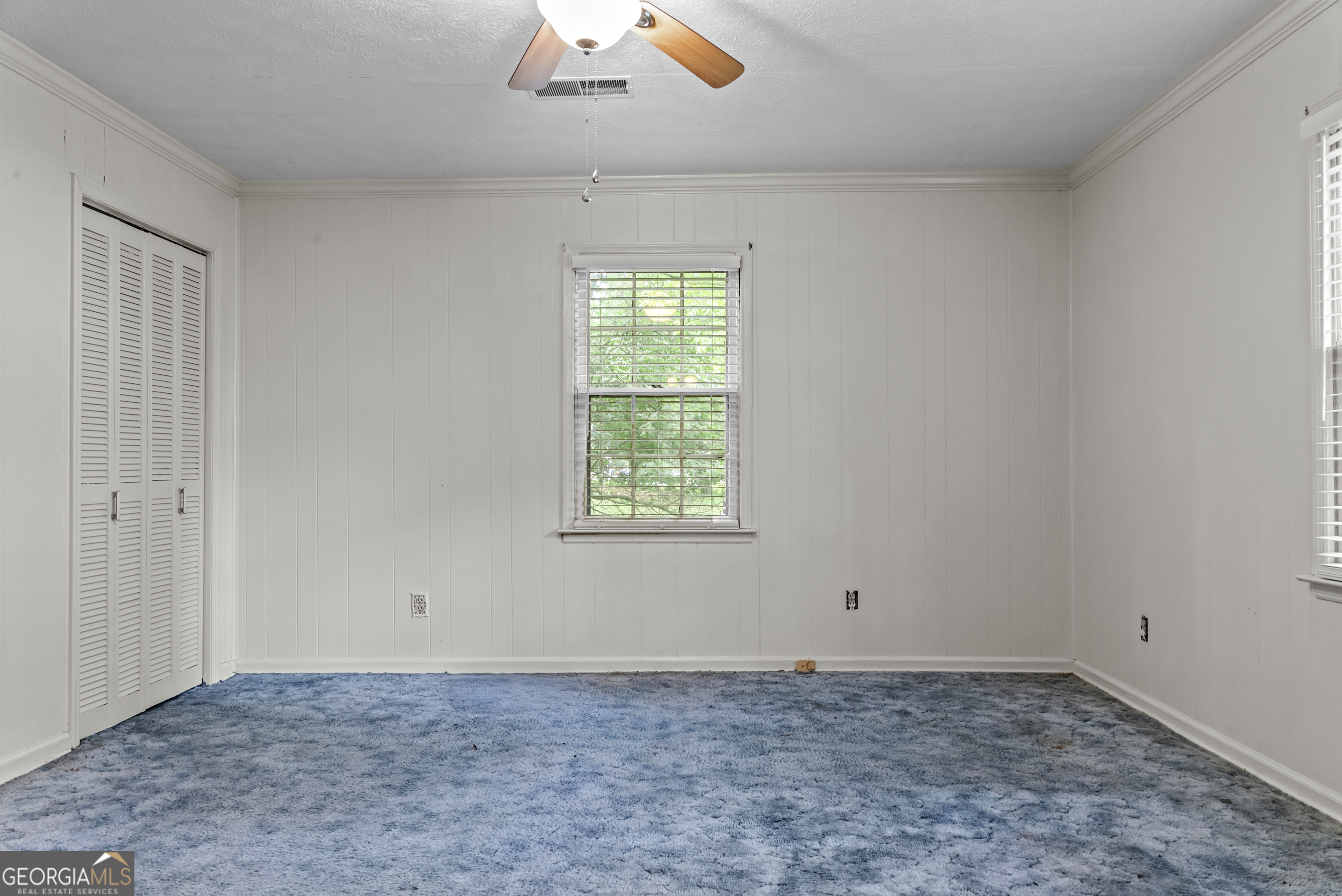 724 Hill Street Madison, GA 30650 - Photo 28 of 36 a view of a window in an empty room