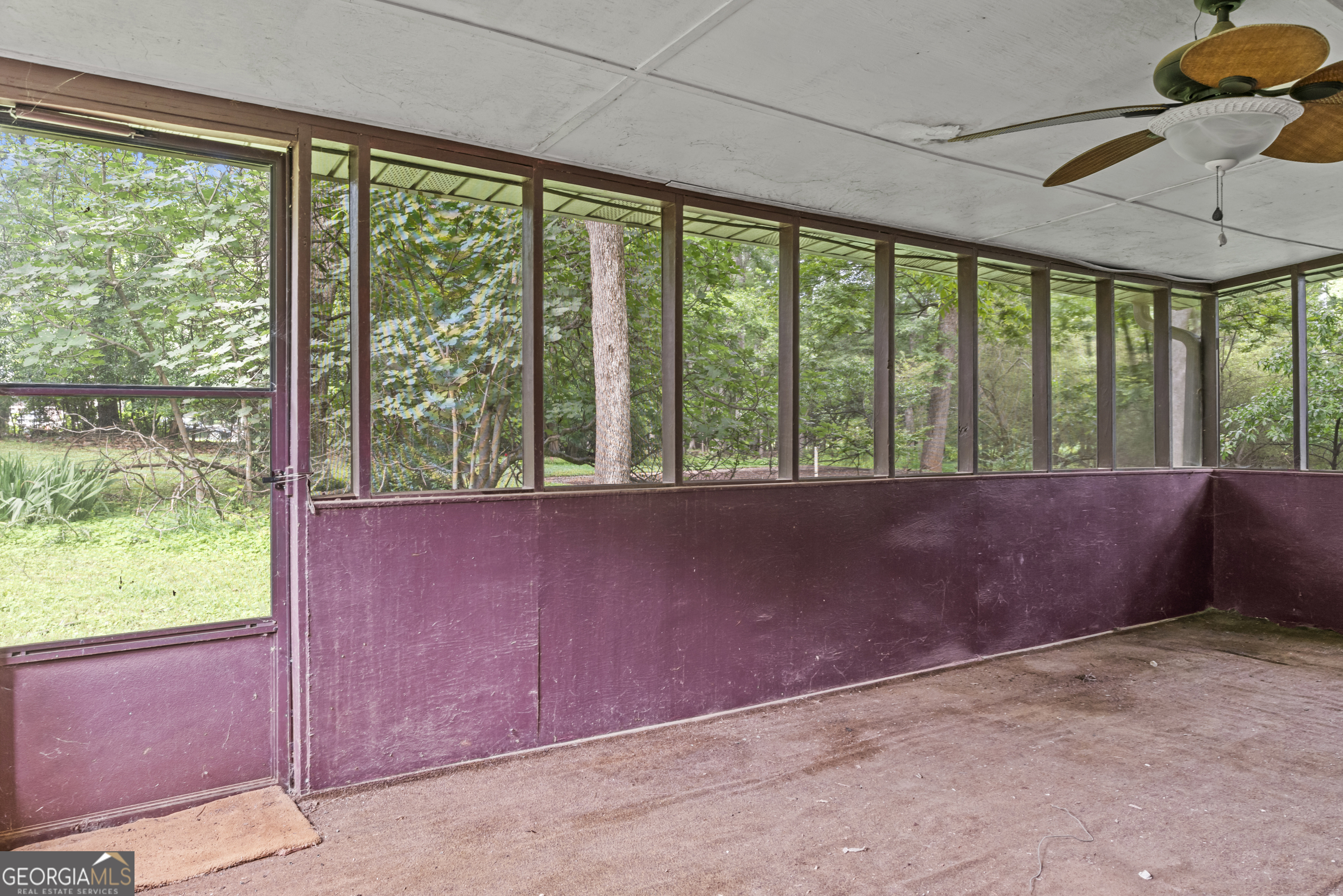 724 Hill Street Madison, GA 30650 - Photo 32 of 36 wooden floor and window in an empty room