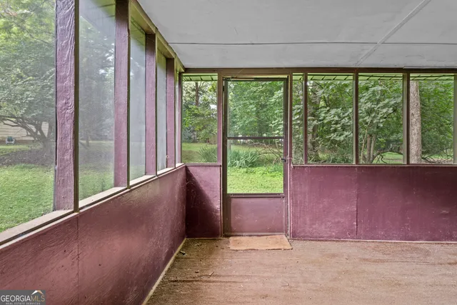 a view of a kitchen with a sink and a fireplace