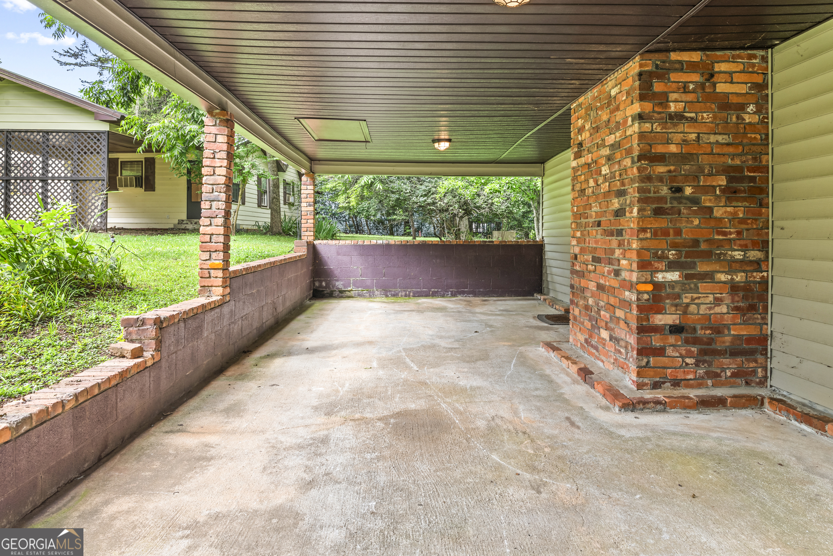 724 Hill Street Madison, GA 30650 - Photo 8 of 36 a view of porch with seating space