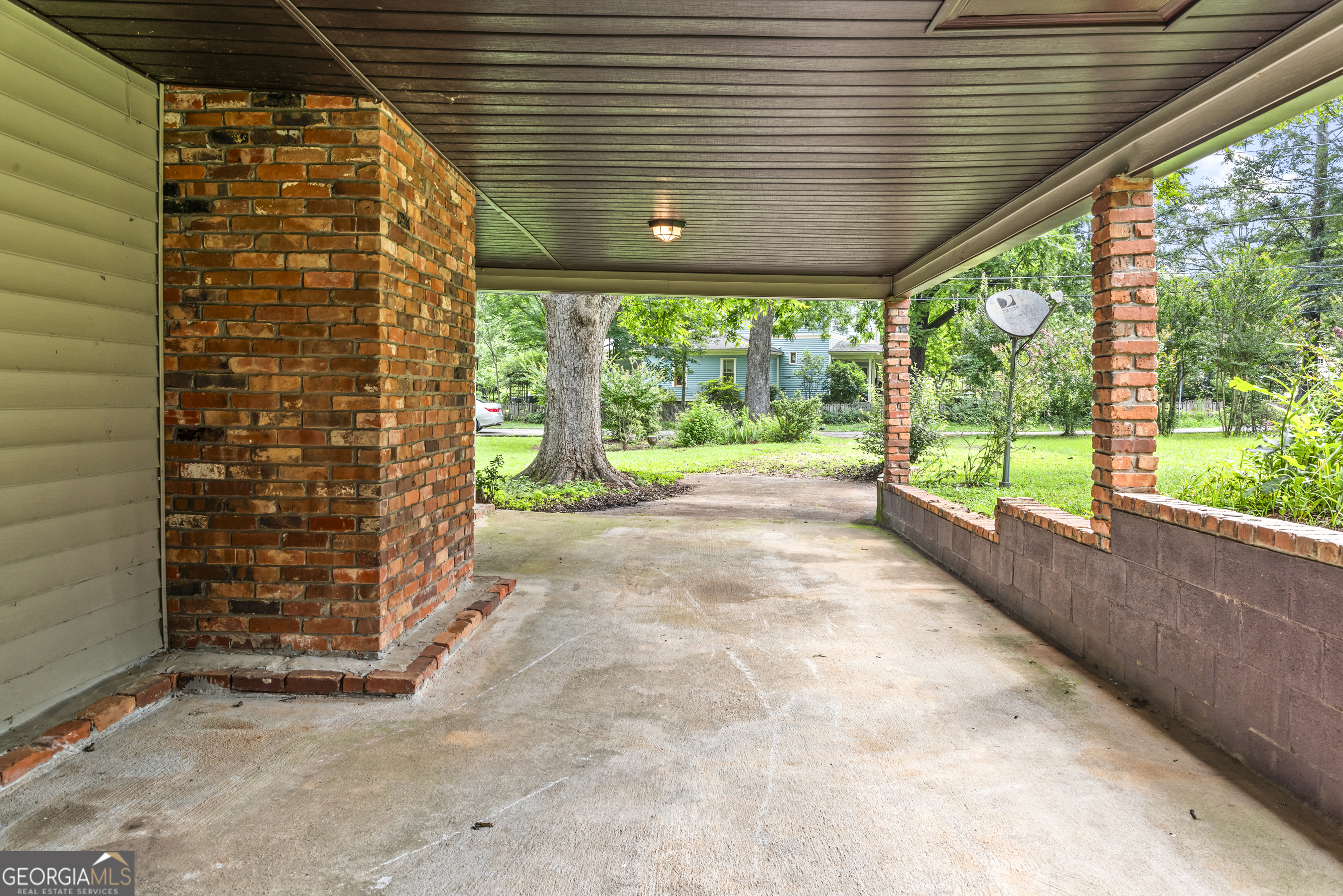 724 Hill Street Madison, GA 30650 - Photo 9 of 36 a view of backyard with green space