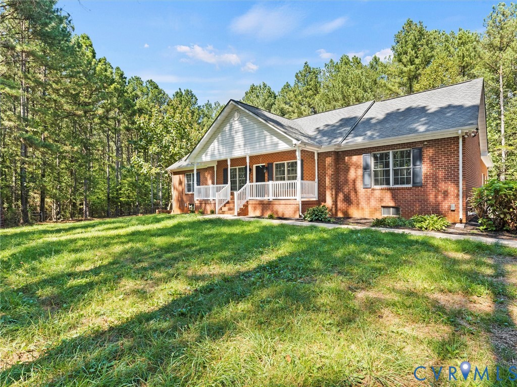 12 Henderson Road New Canton, VA 23123 - Photo 46 of 49 Brick exterior with white trim, covered front porc
