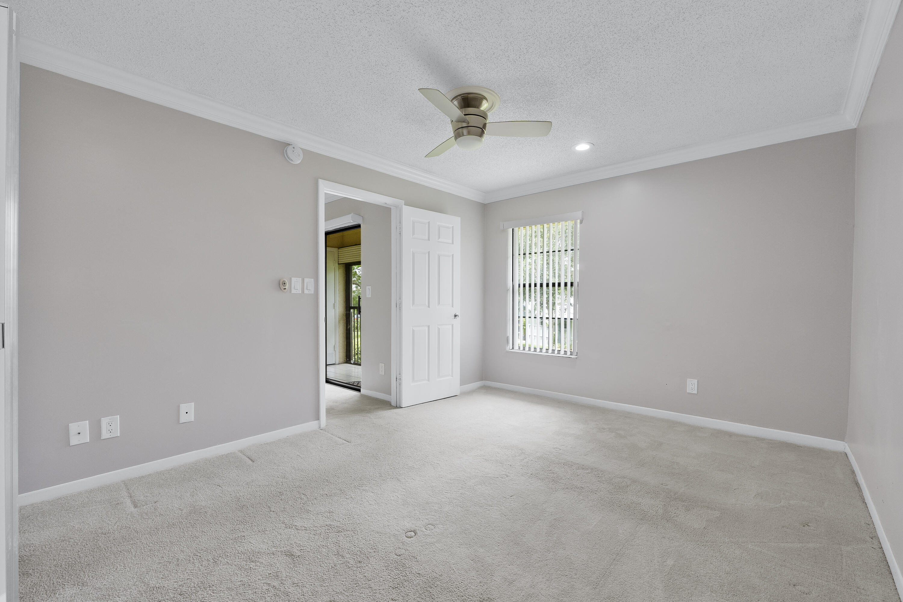 9413 Boca Cove Circle, Unit 1107 Boca Raton, FL 33428 - Photo 13 of 32 a view of an empty room with a window
