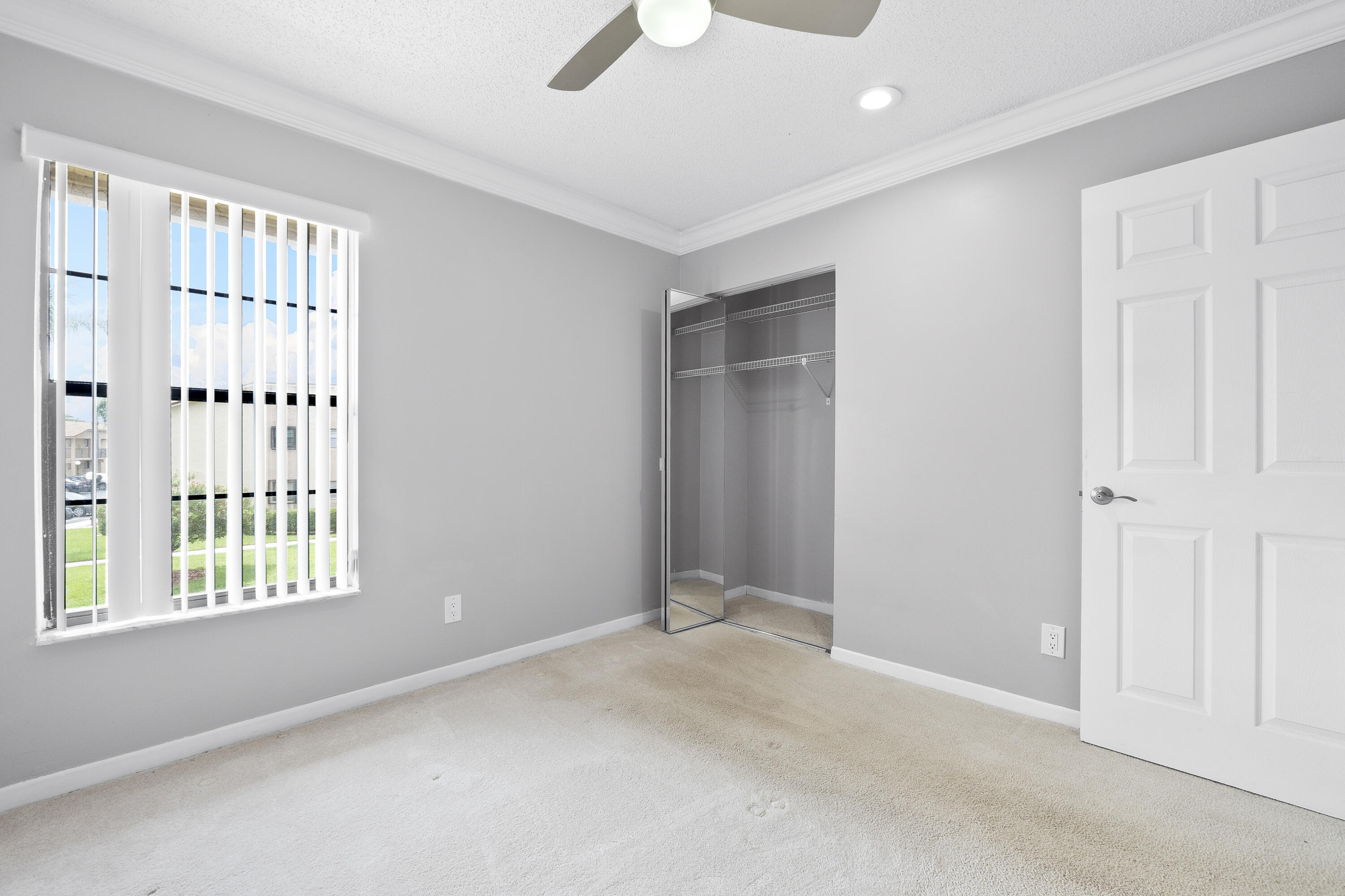 9413 Boca Cove Circle, Unit 1107 Boca Raton, FL 33428 - Photo 15 of 32 a view of an empty room with a window