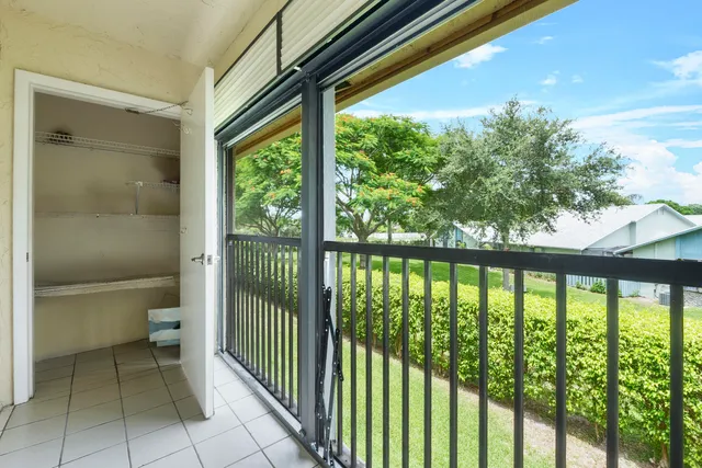a view of a balcony with toilet
