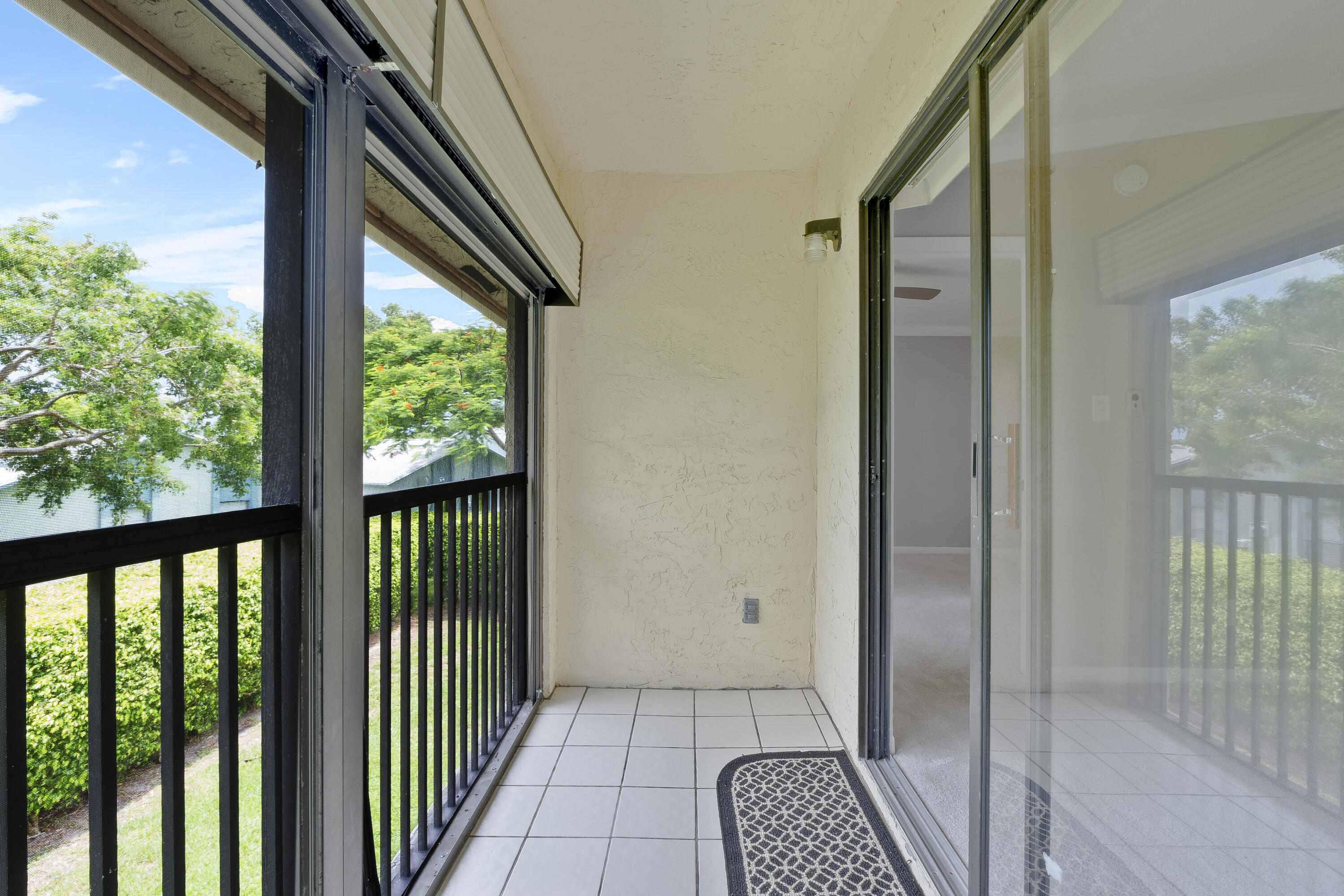 9413 Boca Cove Circle, Unit 1107 Boca Raton, FL 33428 - Photo 19 of 32 a view of a balcony