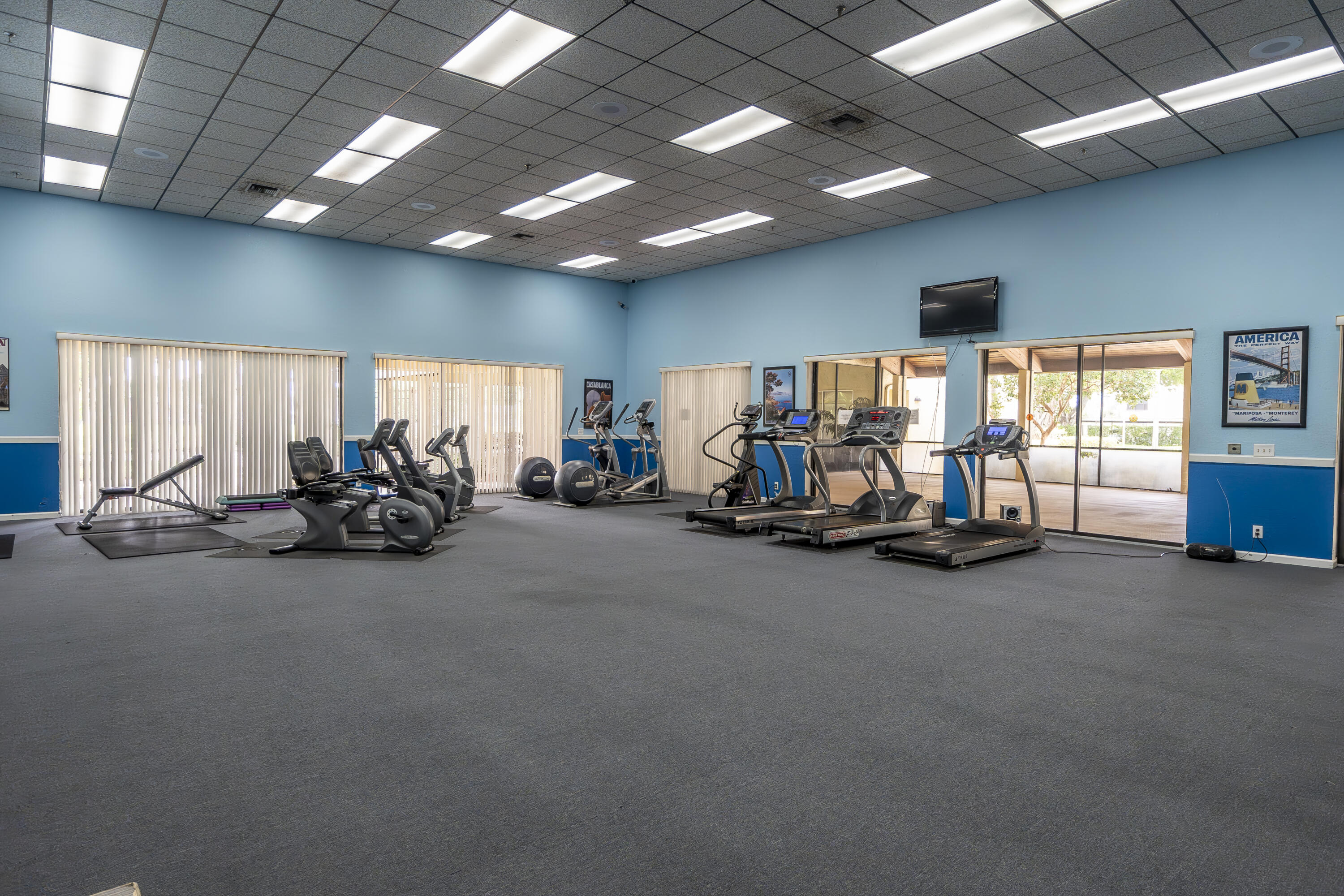 9413 Boca Cove Circle, Unit 1107 Boca Raton, FL 33428 - Photo 25 of 32 a view of a room with gym equipment