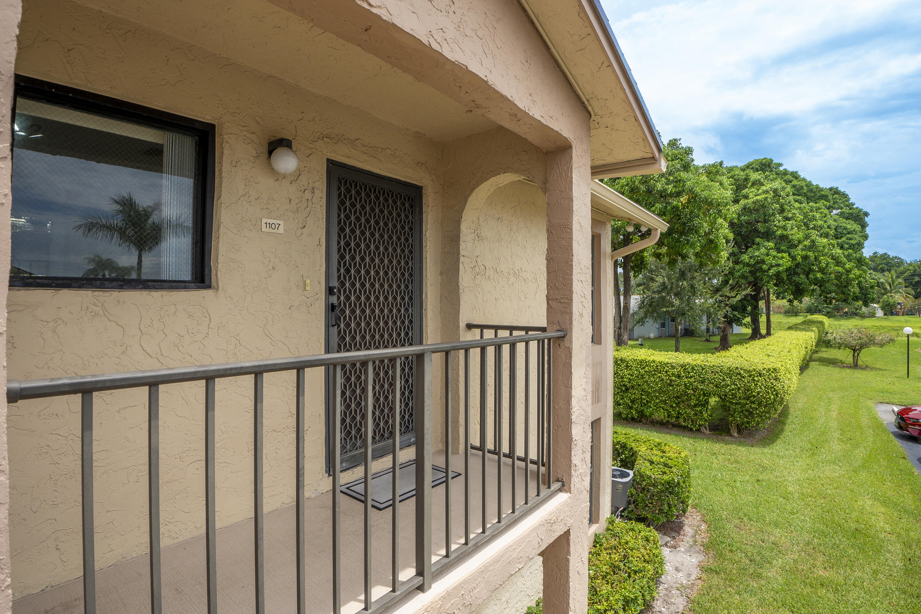 9413 Boca Cove Circle, Unit 1107 Boca Raton, FL 33428 - Photo 5 of 32 a view of a balcony