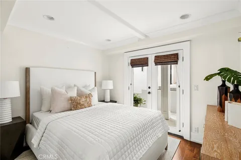 a bedroom with a bed and a walk in closet