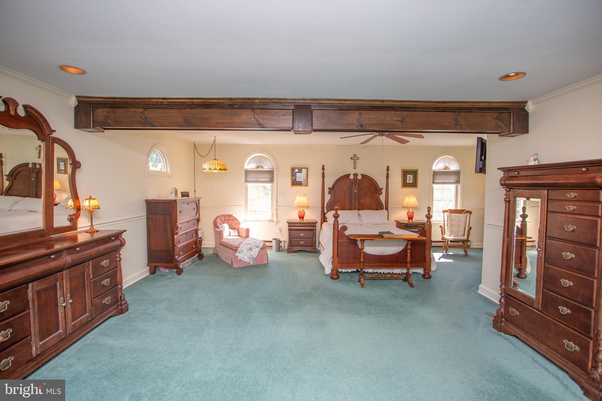 2018 Buckingham Drive Jamison, PA 18929 - Photo 12 of 28 a living room with furniture and a chandelier
