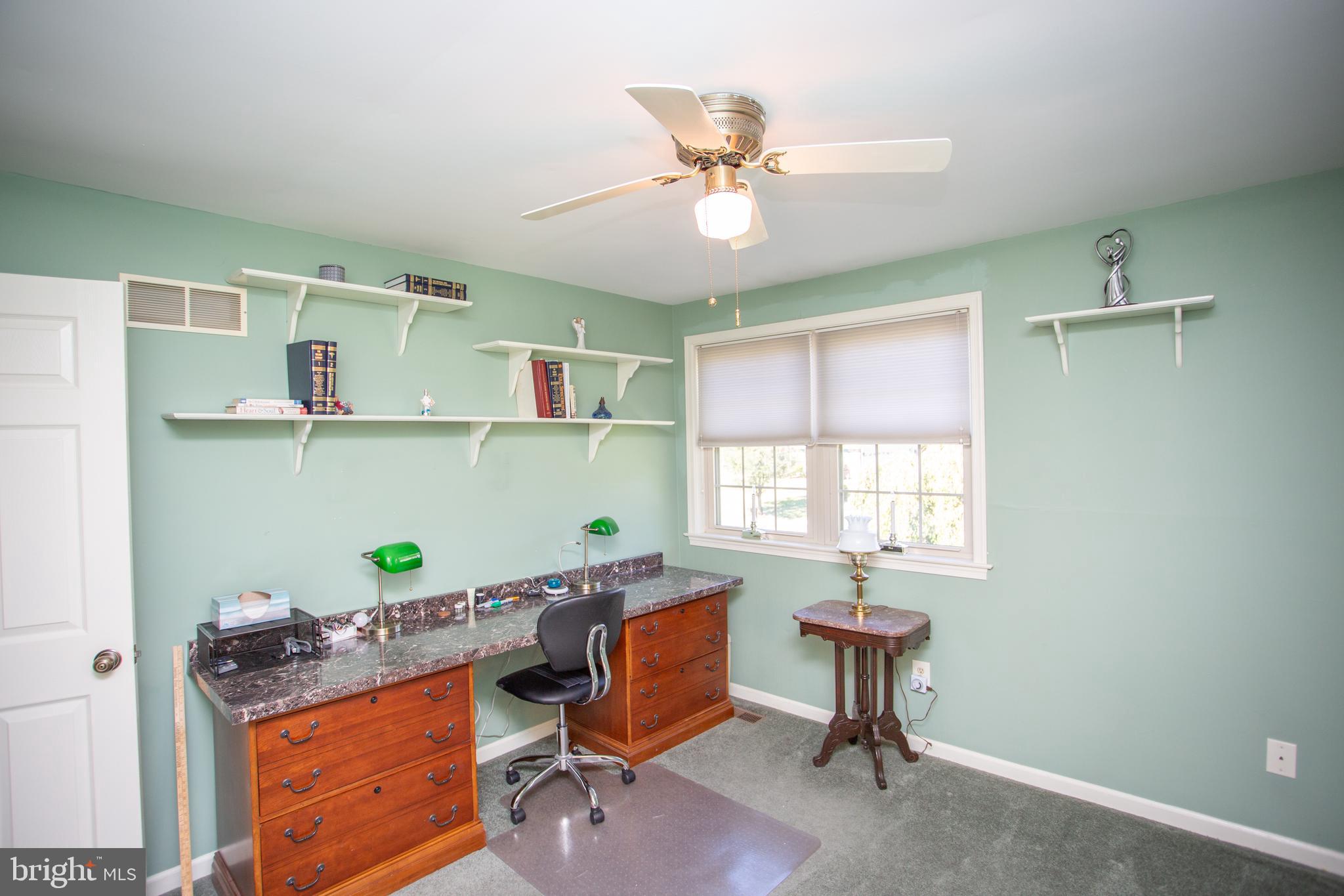 2018 Buckingham Drive Jamison, PA 18929 - Photo 18 of 28 a view of a workspace with furniture and a window